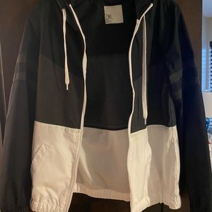 black gray and white windbreaker